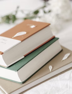 JustRead Publicity Tours | buzzing about books | Christian fiction | clean reads | sweet reads | wholesome fiction petals on a book stack photo credit Olha Ruskykh